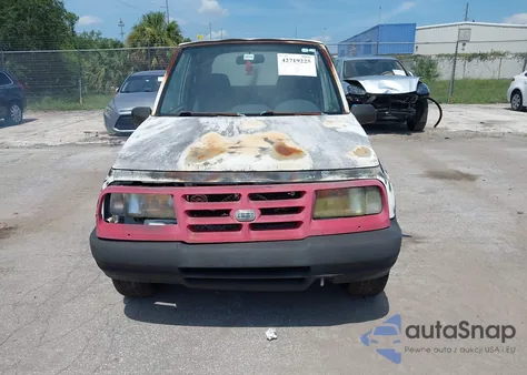 1996 Geo Tracker из США, поврежденный, VIN 2CNBE1862T6948982